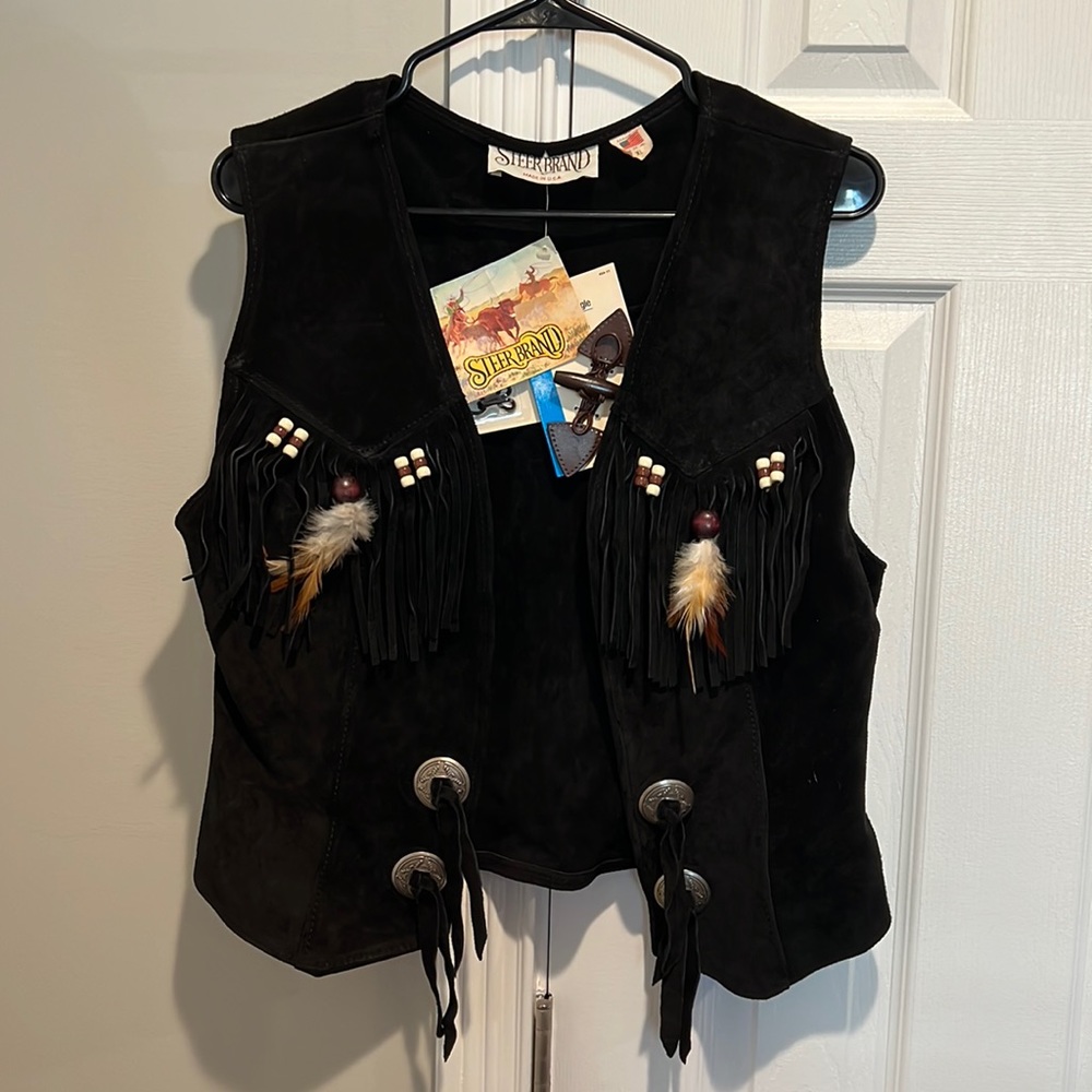 Genuine leather vest with feather, fringe, and beads
